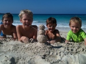Building a "snowman" on the beach!